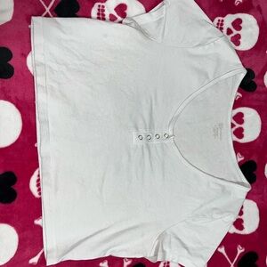 - White NOBO button baby tee size XL (15-17)
- In pretty good condition is used